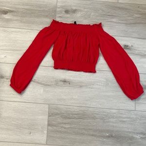 Red cropped long sleeve off the shoulder shirt!